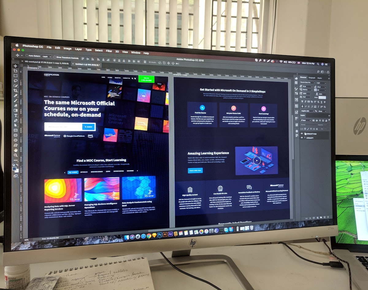Creative workspace with design tools and notebook